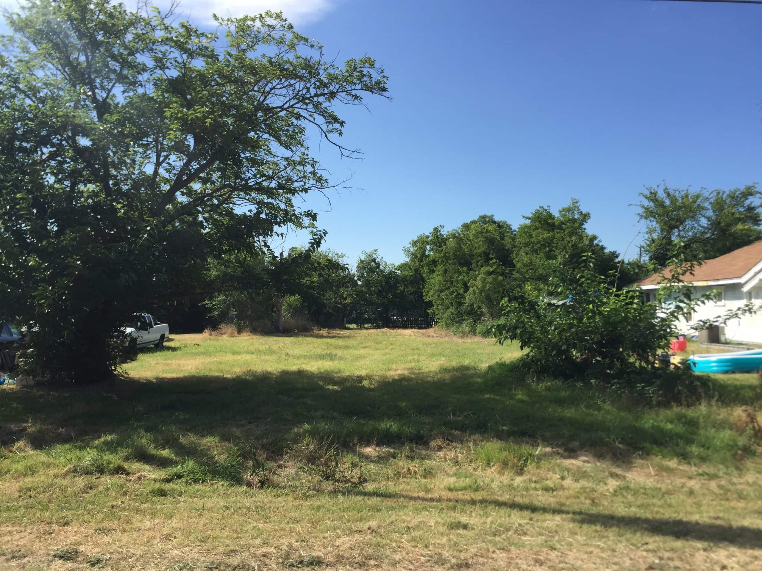 Vacant land in Hillsboro, West Hill County, suitable for development.