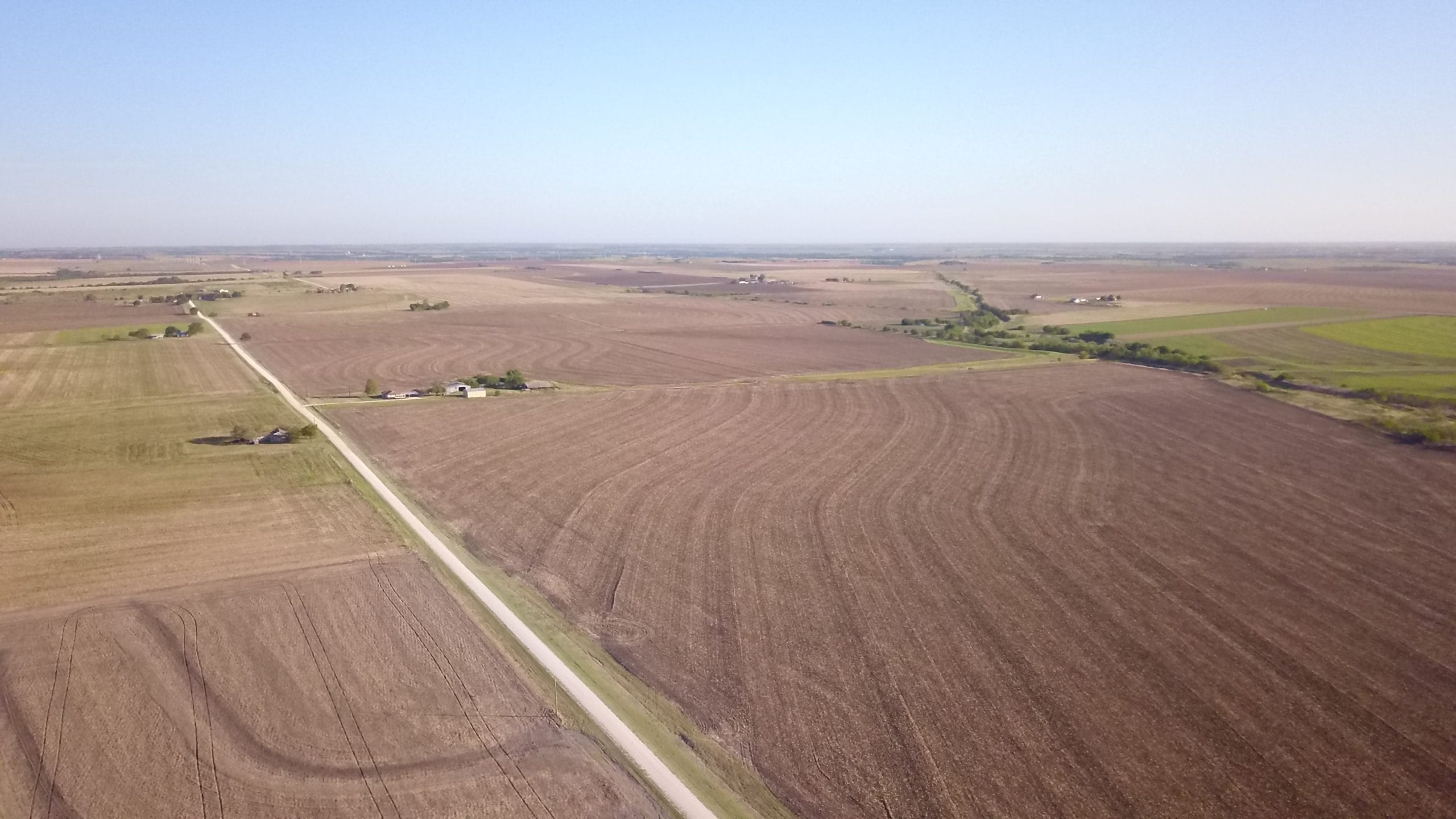 Aerial view of rural farmland in Hillsboro, West Hill County, Texas.