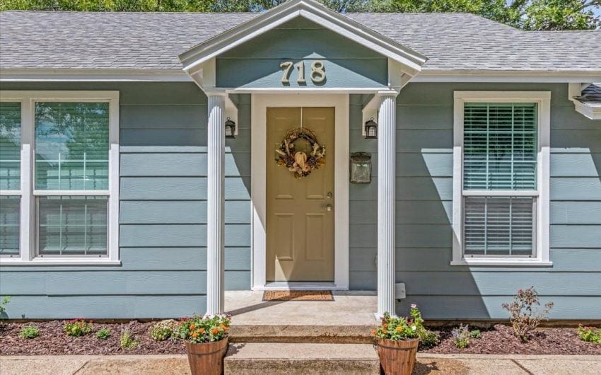 Home in West Texas with welcoming front door and wreath.